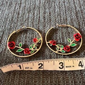 Floral rose detail gold tone hoop earrings